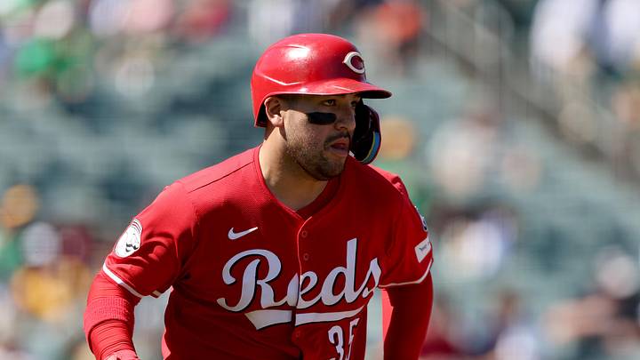 Cincinnati Reds catcher Jose Trevino (35) runs to first base