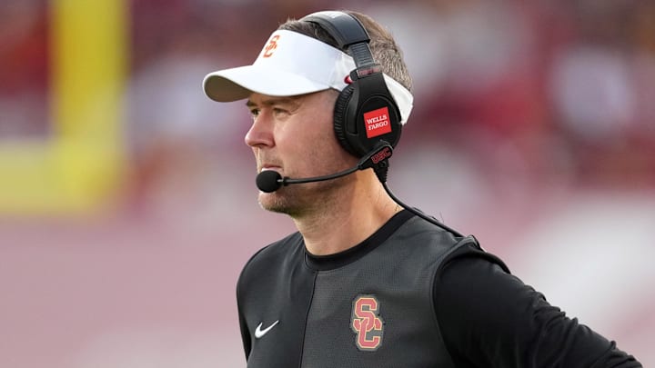 Aug 30, 2025; Los Angeles, California, USA; Southern California Trojans head coach Lincoln Riley watches from the sidelines against the Missouri State Bears in the first half at United Airlines Field at Los Angeles Memorial Coliseum. Mandatory Credit: Kirby Lee-Imagn Images