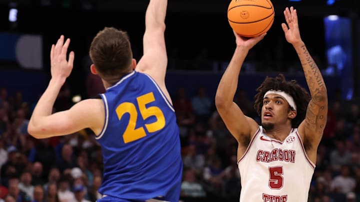 Mar 20, 2026; Tampa, FL, USA; Alabama Crimson Tide forward Amari Allen (5) shoots against Hofstra Pride guard German Plotnikov (25) in the second half during a first round game of the men's 2026 NCAA Tournament at Benchmark International Arena. Mandatory Credit: Matt Pendleton-Imagn Images