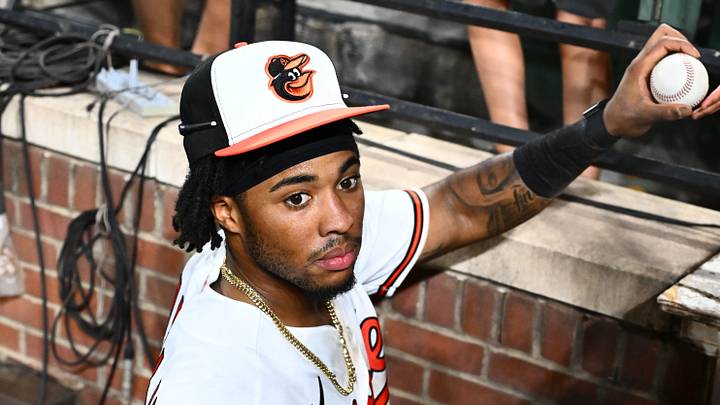 Aug 4, 2026; Baltimore, Maryland, USA; Baltimore Orioles left fielder Christian Franklin (27) signs autographs for fans after the game against the Los Angeles Angels at Oriole Park at Camden Yards. Mandatory Credit: James A. Pittman-Imagn Images