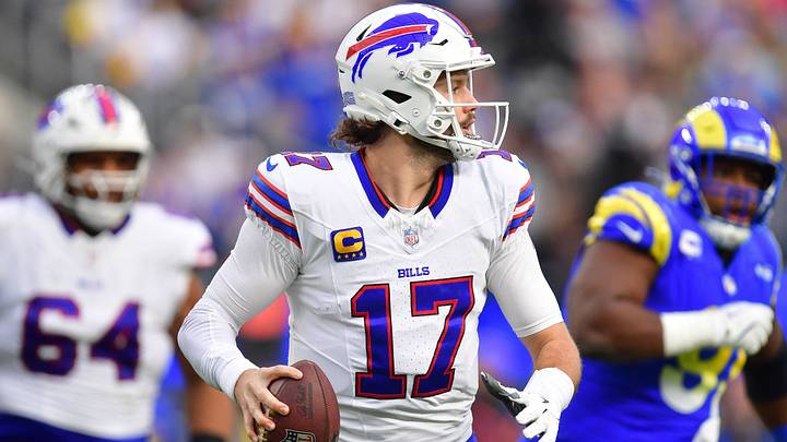 Buffalo Bills quarterback Josh Allen moves out to pass against the Los Angeles Rams during the first half at SoFi Stadium. Buffalo Bills quarterback Josh Allen moves out to pass against the Los Angeles Rams during the first half at SoFi Stadium.
