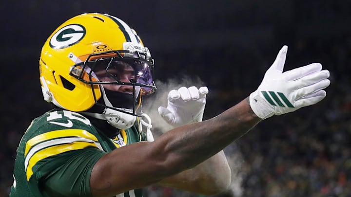 Green Bay Packers cornerback Bo Melton (16) celebrates a touchdown against the Chicago Bears. Green Bay Packers cornerback Bo Melton (16) celebrates a touchdown against the Chicago Bears.