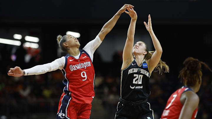 May 19, 2023; Washington, District of Columbia, USA; Washington Mystics guard Natasha Cloud (9) blocks the shot of New York Liberty guard Sabrina Ionescu (20) in the second quarter at Entertainment & Sports Arena. Mandatory Credit: Geoff Burke-Imagn Images May 19, 2023; Washington, District of Columbia, USA; Washington Mystics guard Natasha Cloud (9) blocks the shot of New York Liberty guard Sabrina Ionescu (20) in the second quarter at Entertainment & Sports Arena. Mandatory Credit: Geoff Burke-Imagn Images