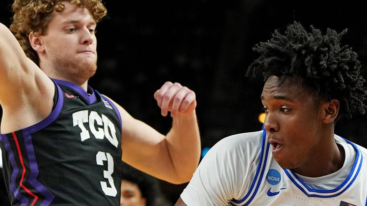 Mar 21, 2026; Greenville, SC, USA; Texas Christian University Horned Frogs guard Liutauras Lelevicius (3) atempts to block a shot by Duke Blue Devils center Patrick Ngongba (21) during the first half during a second round game of the men's 2026 NCAA Tournament at Bon Secours Wellness Arena. Mandatory Credit: Bob Donnan-Imagn Images