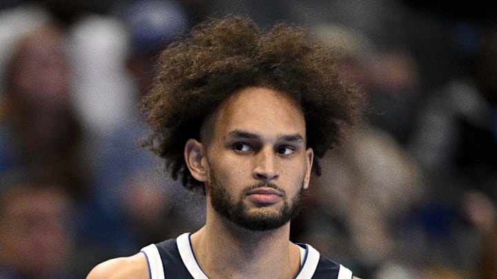 Nov 14, 2025; Dallas, Texas, USA; Dallas Mavericks head coach Jason Kidd and center Dereck Lively II (2) look on during the second half against the LA Clippers in an NBA Cup game at the American Airlines Center. Mandatory Credit: Jerome Miron-Imagn Images