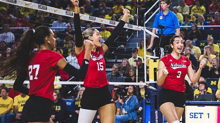 Harper Murray, Andi Jackson and Virginia Adriano celebrate during the match Friday in Ann Arbor.