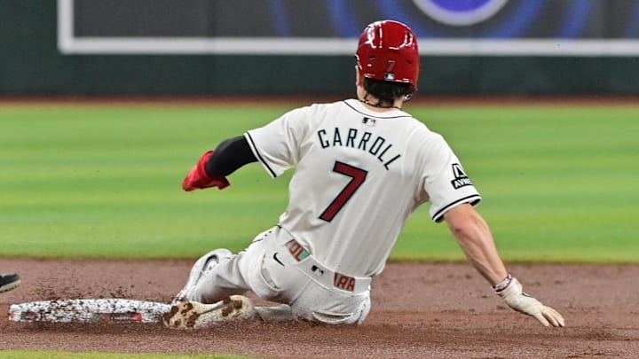 Apr 17, 2024; Phoenix, Arizona, USA; Arizona Diamondbacks outfielder Corbin Carroll (7) steals second base in the first inning against the Chicago Cubs at Chase Field. Mandatory Credit: Matt Kartozian-Imagn Images Apr 17, 2024; Phoenix, Arizona, USA; Arizona Diamondbacks outfielder Corbin Carroll (7) steals second base in the first inning against the Chicago Cubs at Chase Field. Mandatory Credit: Matt Kartozian-Imagn Images