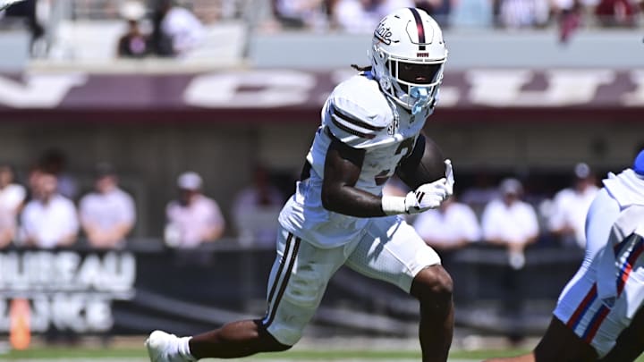 Sep 21, 2024; Starkville, Mississippi, USA; Mississippi State Bulldogs wide receiver Kevin Coleman Jr. (3) runs the ball against the Florida Gators during the second quarter at Davis Wade Stadium at Scott Field. Mandatory Credit: Matt Bush-Imagn Images