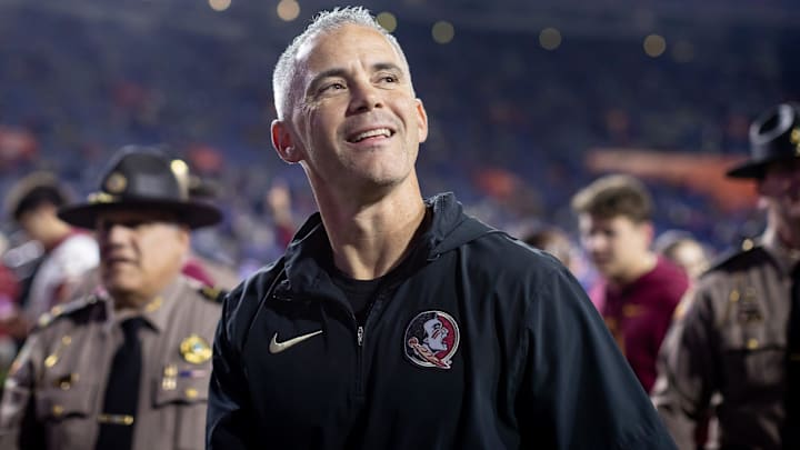 Florida State Seminoles head coach Mike Norvell smiles to the crowd after the game against the Florida Gators at Steve Spurrier Field at Ben Hill Griffin Stadium in Gainesville, FL on Saturday, November 25, 2023. [Matt Pendleton/Gainesville Sun]