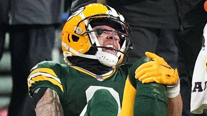 Green Bay Packers receiver Christian Watson (9) grimaces after hurting his knee against the Chiefs in 2023. Green Bay Packers receiver Christian Watson (9) grimaces after hurting his knee against the Chiefs in 2023.
