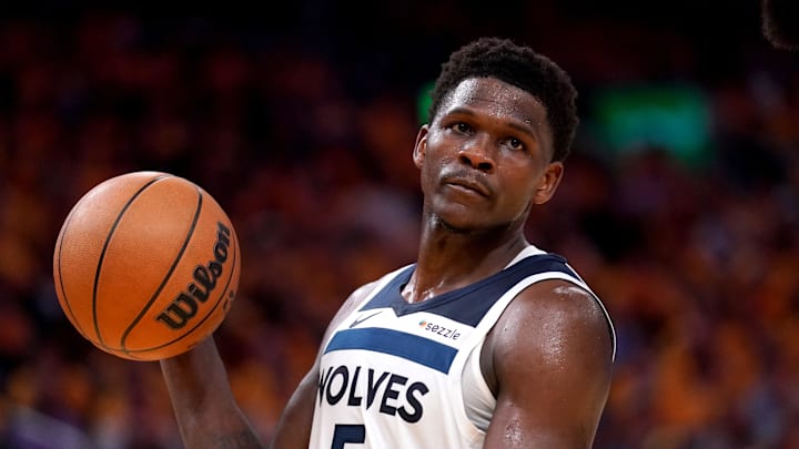 May 12, 2025; San Francisco, California, USA; Minnesota Timberwolves guard Anthony Edwards (5) holds onto the ball after being called for a foul against the Golden State Warriors in the third quarter during game four of the second round for the 2025 NBA Playoffs at Chase Center. Mandatory Credit: Cary Edmondson-Imagn Images
