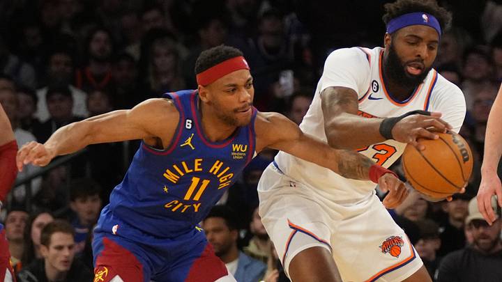 Denver Nuggets small forward Bruce Brown (11) defends against New York Knicks center Mitchell Robinson (23) during the first half at Madison Square Garden.
