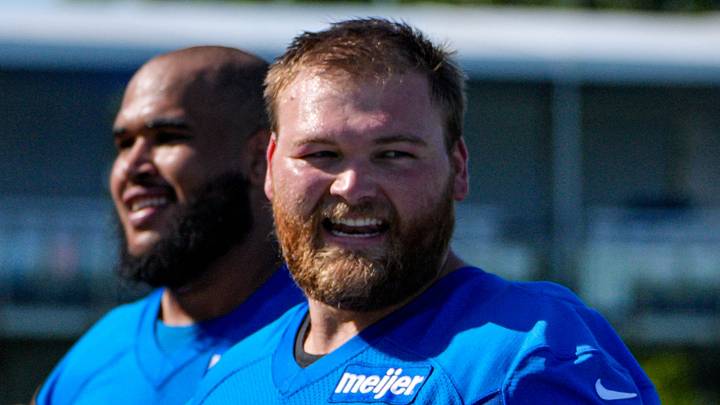 Detroit Lions center Cade Mays (64), left, talks to offensive tackle Penei Sewell (58) as they walk off the field after practice during training camp at Meijer Performance Center in Allen Park on Wednesday, July 29, 2026. Detroit Lions center Cade Mays (64), left, talks to offensive tackle Penei Sewell (58) as they walk off the field after practice during training camp at Meijer Performance Center in Allen Park on Wednesday, July 29, 2026.