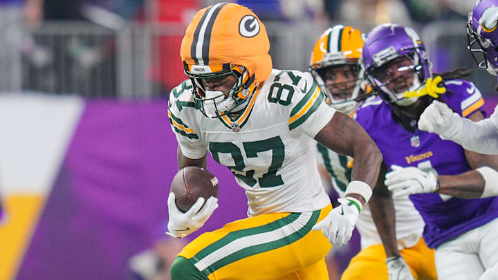 Dec 29, 2024; Minneapolis, Minnesota, USA; Green Bay Packers wide receiver Romeo Doubs (87) runs after the catch against Minnesota Vikings in the fourth quarter at U.S. Bank Stadium. Mandatory Credit: Brad Rempel-Imagn Images Dec 29, 2024; Minneapolis, Minnesota, USA; Green Bay Packers wide receiver Romeo Doubs (87) runs after the catch against Minnesota Vikings in the fourth quarter at U.S. Bank Stadium. Mandatory Credit: Brad Rempel-Imagn Images
