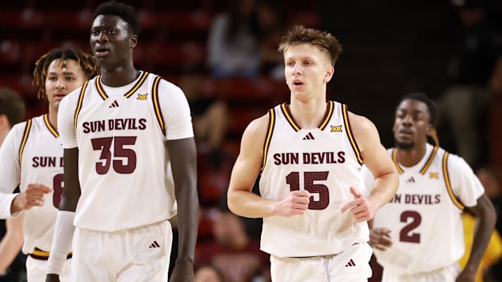 Jan 3, 2026; Tempe, Arizona, USA; Arizona State Sun Devils center Massamba Diop (35) and guard Noah Meeusen (15) against the Colorado Buffaloes at Desert Financial Arena. Mandatory Credit: Mark J. Rebilas-Imagn Images