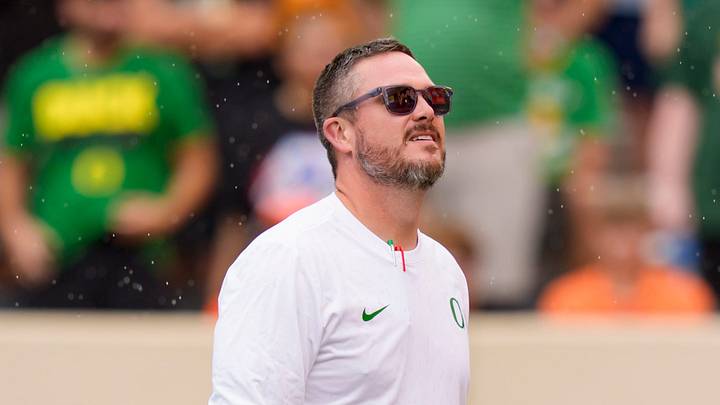 Oregon head coach Dan Lanning takes in the rain as the Oregon Ducks face the Oklahoma State Cowboys on Sept. 12, 2026, at Boone Pickens Stadium in Stillwater, Oklahoma. Oregon head coach Dan Lanning takes in the rain as the Oregon Ducks face the Oklahoma State Cowboys on Sept. 12, 2026, at Boone Pickens Stadium in Stillwater, Oklahoma.
