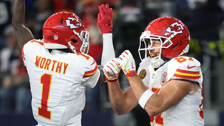 Nov 27, 2025; Arlington, Texas, USA; Kansas City Chiefs wide receiver Xavier Worthy (1) and Kansas City Chiefs tight end Travis Kelce (87) celebrate after a touchdown against the Dallas Cowboys during the first quarter at AT&T Stadium. Mandatory Credit: Kevin Jairaj-Imagn Images