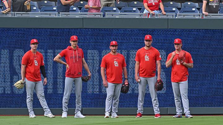 Jun 18, 2026; Kansas City, Missouri, USA;  St. Louis Cardinals players stand in the outfield before a game against the Kansas City Royals at Kauffman Stadium. Mandatory Credit: Peter Aiken-Imagn Images