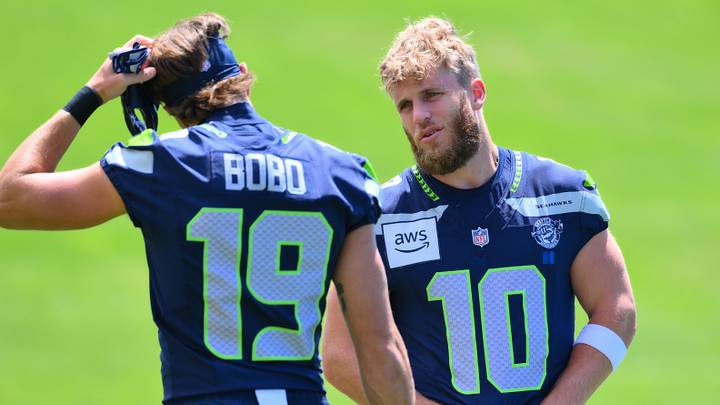 Jun 9, 2026; Renton, WA, USA; Seattle Seahawks wide receiver Cooper Kupp (10) talks to wide receiver Jake Bobo (19) during minicamp at Virginia Mason Athletic Center. Mandatory Credit: Steven Bisig-Imagn Images