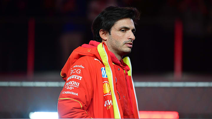 Nov 23, 2024; Las Vegas, Nevada, USA; Scuderia Ferrari driver Carlos Sainz (55) is intriduced before the Las Vegas Grand Prix at Las Vegas Circuit. Mandatory Credit: Gary A. Vasquez-Imagn Images