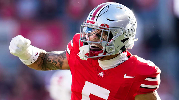 Ohio State Buckeyes cornerback Aaron Scott Jr. (5) celebrates during the second half of the NCAA football game against the Rutgers Scarlet Knights at Ohio Stadium in Columbus on Nov. 22, 2025. Ohio State won 42-9.