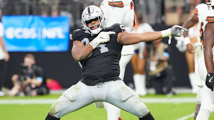 Sep 29, 2024; Paradise, Nevada, USA; Las Vegas Raiders defensive tackle Christian Wilkins (94) celebrates after a penalty overturned a scoring play by the Cleveland Browns during the fourth quarter at Allegiant Stadium.