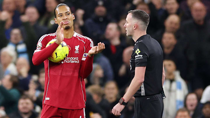 Virgil van Dijk (left) was thwarted by referee Chris Kavanagh.