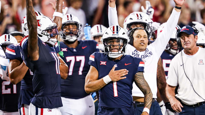 Sep 12, 2025; Tucson, Arizona, USA; Arizona Wildcats quarterback Noah Fifita (1) and teammates celebrate after the touchdown they made is confirmed by replay against the Kansas State Wildcats during the second quarter of the game at Arizona Stadium. Mandatory Credit: Aryanna Frank-Imagn Images