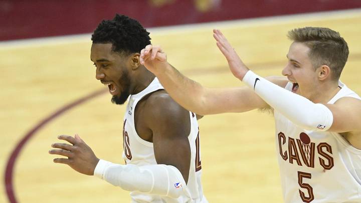 Dec 18, 2023; Cleveland, Ohio, USA; Cleveland Cavaliers guard Donovan Mitchell (45) and guard Sam Merrill (5) celebrate in overtime against the Houston Rockets at Rocket Mortgage FieldHouse. Mandatory Credit: David Richard-Imagn Images Dec 18, 2023; Cleveland, Ohio, USA; Cleveland Cavaliers guard Donovan Mitchell (45) and guard Sam Merrill (5) celebrate in overtime against the Houston Rockets at Rocket Mortgage FieldHouse. Mandatory Credit: David Richard-Imagn Images