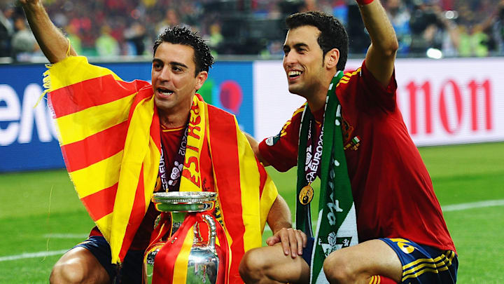 Xavi and Sergio Busquets are both Spain greats.