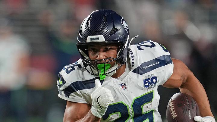 Seattle Seahawks running back Zach Charbonnet rushes the ball