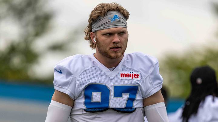 Aug 2, 2026; Allen Park, MI, USA; Detroit Lions defensive end Aidan Hutchinson (97) looks on during Detroit Lions training camp at Meijer Performance Center. Mandatory Credit: Paul Barnick-Imagn Images Aug 2, 2026; Allen Park, MI, USA; Detroit Lions defensive end Aidan Hutchinson (97) looks on during Detroit Lions training camp at Meijer Performance Center. Mandatory Credit: Paul Barnick-Imagn Images