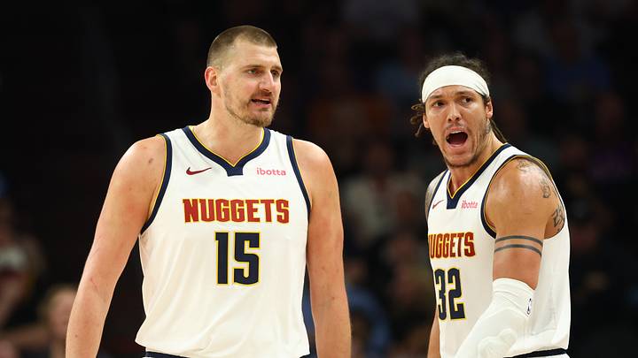 Mar 24, 2026; Phoenix, Arizona, USA; Denver Nuggets center Nikola Jokic (15) and forward Aaron Gordon (32) against the Phoenix Suns at Mortgage Matchup Center.