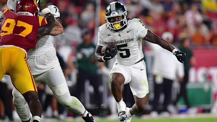 Michigan State Spartans running back Makhi Frazier carries the ball against the Southern California Trojans on Sept. 20.