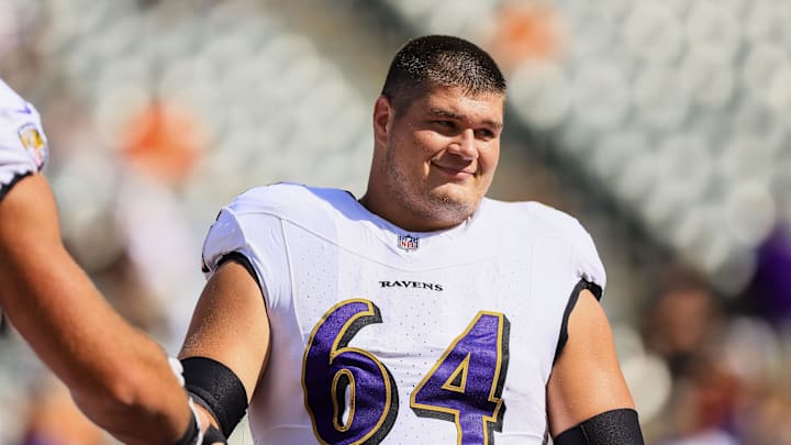 Oct 6, 2024; Cincinnati, Ohio, USA; Baltimore Ravens center Tyler Linderbaum (64) during warmups before the game against the Cincinnati Bengals at Paycor Stadium. Mandatory Credit: Katie Stratman-Imagn Images