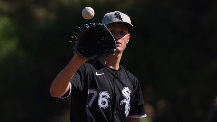 Chicago White Sox pitcher Noah Schultz (76) throws in a spring training game against the San Diego Padres at Camelback Ranch. 