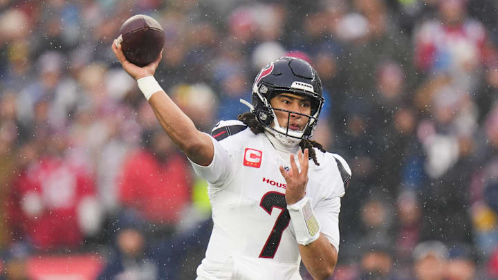Jan 18, 2026; Foxborough, MA, USA; Houston Texans quarterback C.J. Stroud (7) throws in the first quarter against the New England Patriots in an AFC Divisional Round game at Gillette Stadium. Mandatory Credit: Brian Fluharty-Imagn Images