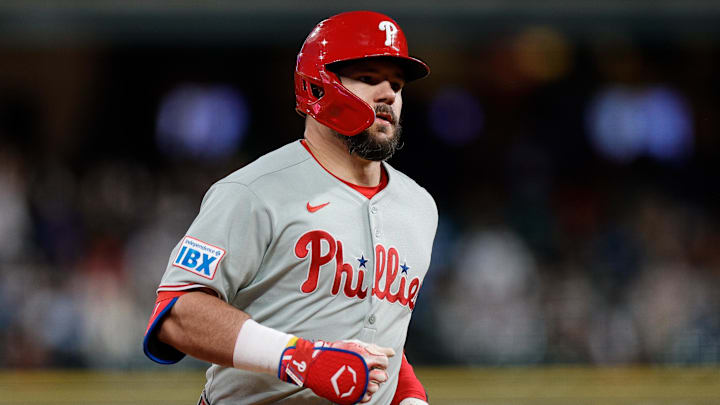 May 20, 2025; Denver, Colorado, USA; Philadelphia Phillies designated hitter Kyle Schwarber (12) rounds the bases on a solo home run in the seventh inning against the Colorado Rockies at Coors Field. 
