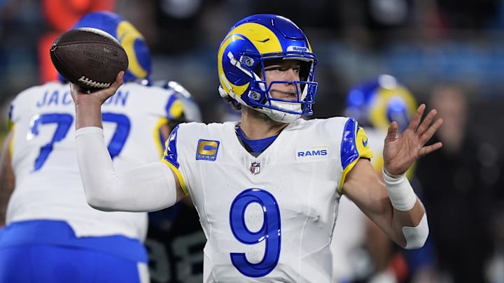 Jan 10, 2026; Charlotte, NC, USA; Los Angeles Rams quarterback Matthew Stafford (9) drops back to pass against the Carolina Panthers in the first half during the NFC Wild Card Round game at Bank of America Stadium. Mandatory Credit: Jim Dedmon-Imagn Images