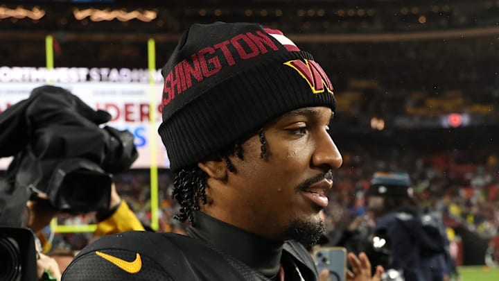 Oct 13, 2025; Landover, Maryland, USA; Washington Commanders quarterback Jayden Daniels (5) greets Chicago Bears cornerback Kyler Gordon (6) after the game at Northwest Stadium. Mandatory Credit: Geoff Burke-Imagn Images