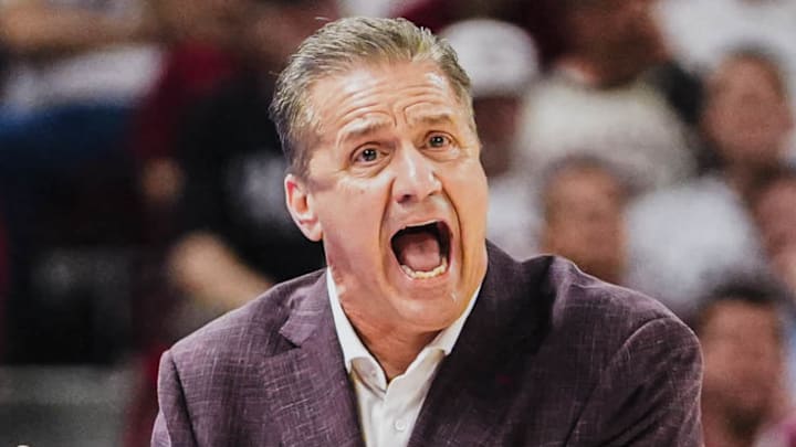 Arkansas Razorbacks coach John Calipari exhorts his team during the 86-81 overtime win against the Texas Longhorns at Bud Walton Arena on Wednesday.