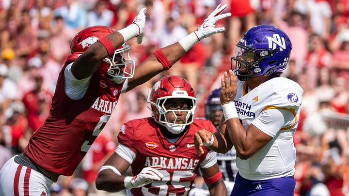 Arkansas Razorbacks JACK linebacker Charlie Collins rushes North Alabama quarterback Destin Wade. Arkansas Razorbacks JACK linebacker Charlie Collins rushes North Alabama quarterback Destin Wade.