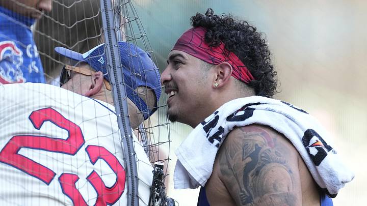 Jun 27, 2026; Milwaukee, Wisconsin, USA; Chicago Cubs pitcher Daniel Palencia (48) poses for a photo with a fan before a game against the Milwaukee Brewers at American Family Field. Mandatory Credit: Michael McLoone-Imagn Images