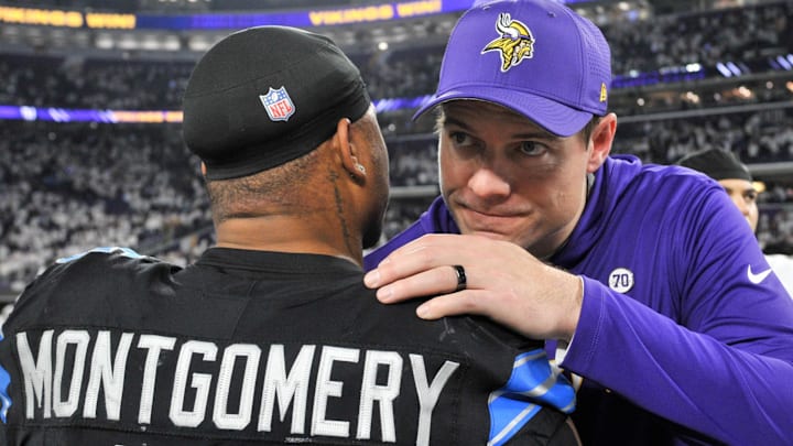 Minnesota Vikings head coach Kevin O'Connell speaks with Detroit Lions running back David Montgomery (5) Minnesota Vikings head coach Kevin O'Connell speaks with Detroit Lions running back David Montgomery (5)