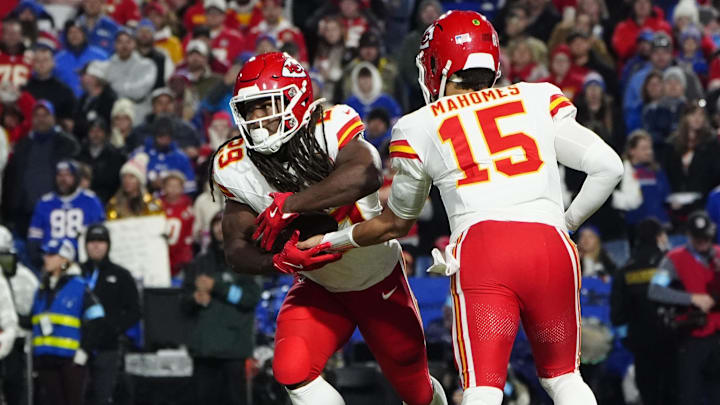  Kansas City Chiefs quarterback Patrick Mahomes (15) hands the ball off to Kansas City Chiefs running back Kareem Hunt (29) against the Buffalo Bills during the second half at Highmark Stadium.