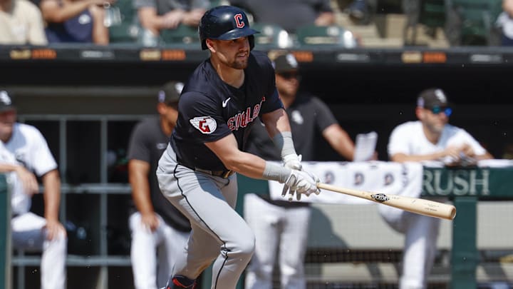 Sep 11, 2024; Chicago, Illinois, USA; Cleveland Guardians outfielder Lane Thomas (8) hits a two-run single against the Chicago White Sox during the third inning at Guaranteed Rate Field. Mandatory Credit: Kamil Krzaczynski-Imagn Images