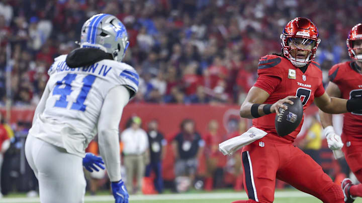 Nov 10, 2024; Houston, Texas, USA; Houston Texans quarterback C.J. Stroud (7) scrambles with the ball as Detroit Lions linebacker James Houston (41) defends during the first quarter at NRG Stadium. Mandatory Credit: Troy Taormina-Imagn Images Nov 10, 2024; Houston, Texas, USA; Houston Texans quarterback C.J. Stroud (7) scrambles with the ball as Detroit Lions linebacker James Houston (41) defends during the first quarter at NRG Stadium. Mandatory Credit: Troy Taormina-Imagn Images