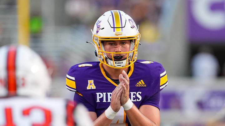 Sep 6, 2025; Greenville, North Carolina, USA;  East Carolina Pirates quarterback Katin Houser (4) gets ready for the snap against the Campbell Fighting Camels during the first half at Dowdy-Ficklen Stadium. Mandatory Credit: James Guillory-Imagn Images