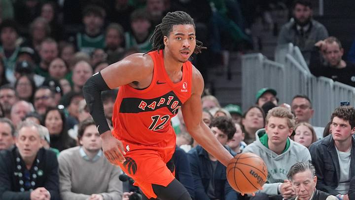 Apr 5, 2026; Boston, Massachusetts, USA; Toronto Raptors forward Collin Murray-Boyles (12) dribbles the ball against the Boston Celtics during the second half at TD Garden. Mandatory Credit: Gregory Fisher-Imagn Images