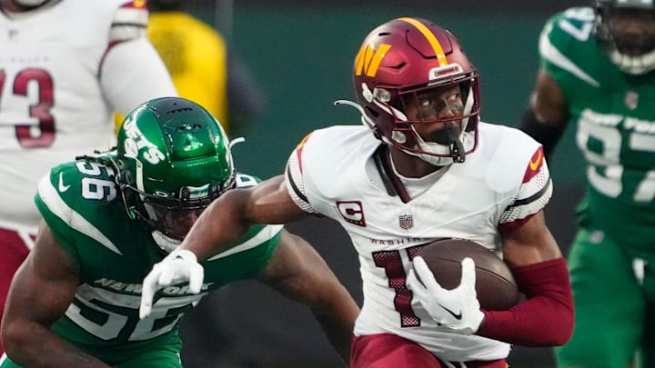 Washington Commanders wide receiver Terry McLaurin runs for a second half first down against the New York Jets.